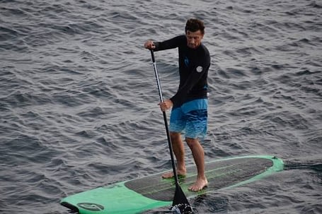 man on paddle board